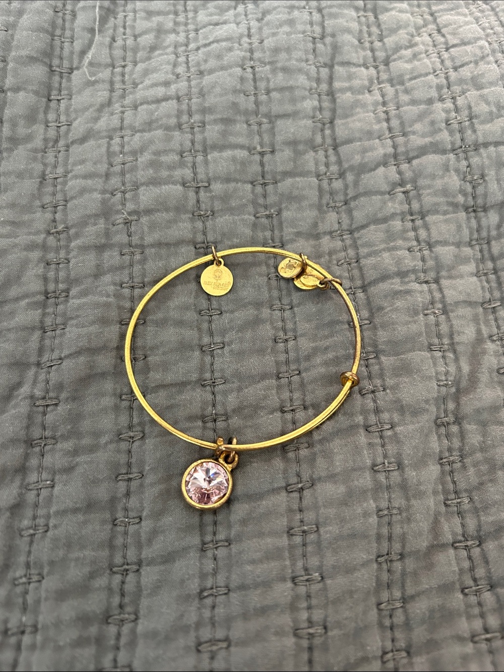 Alex and Ani Gold bracelet with Pink Crystal Charm